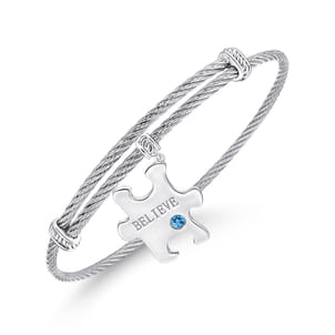 Adjustable Twisted Cable Stainless Steel Bangle with Sterling Silver Blue Topaz Puzzle Piece Charm