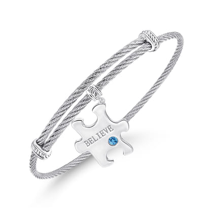 Adjustable Twisted Cable Stainless Steel Bangle with Sterling Silver Blue Topaz Puzzle Piece Charm