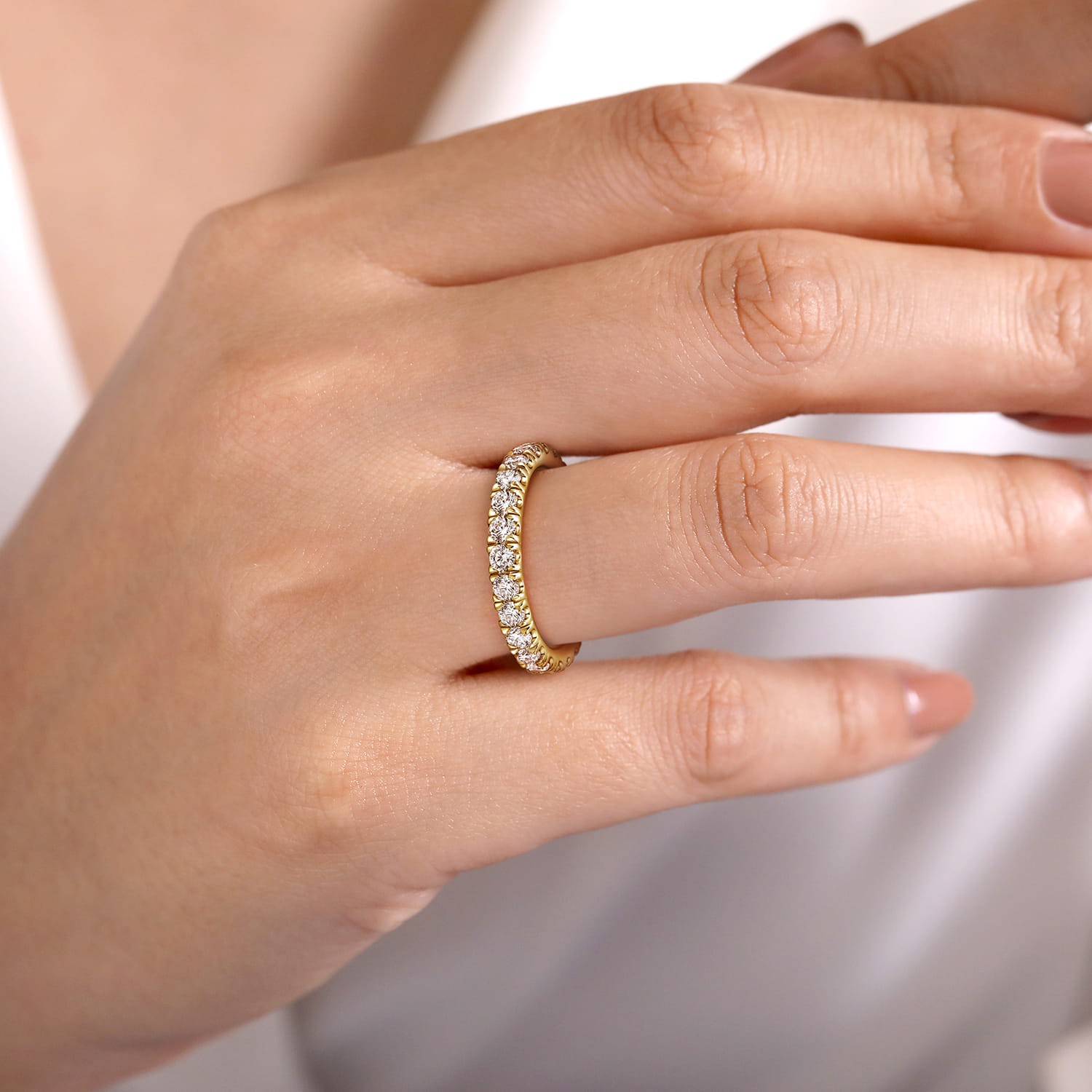 Eternity Band Wedding Ring in 14k Yellow Gold with Round Natural Diamond at Gabriel & Co. - Shot 5