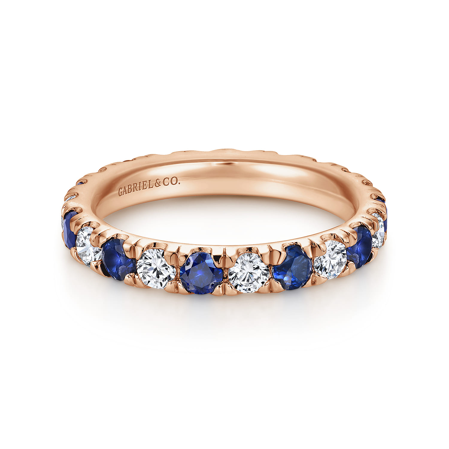 Eternity Band Wedding Ring in 14k Rose Gold with Round Sapphire at Gabriel & Co. - Shot 1