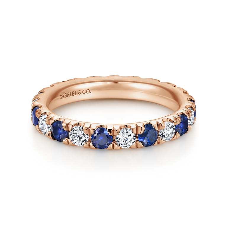 Eternity Band Wedding Ring in 14k Rose Gold with Round Sapphire at Gabriel & Co. - Shot 1