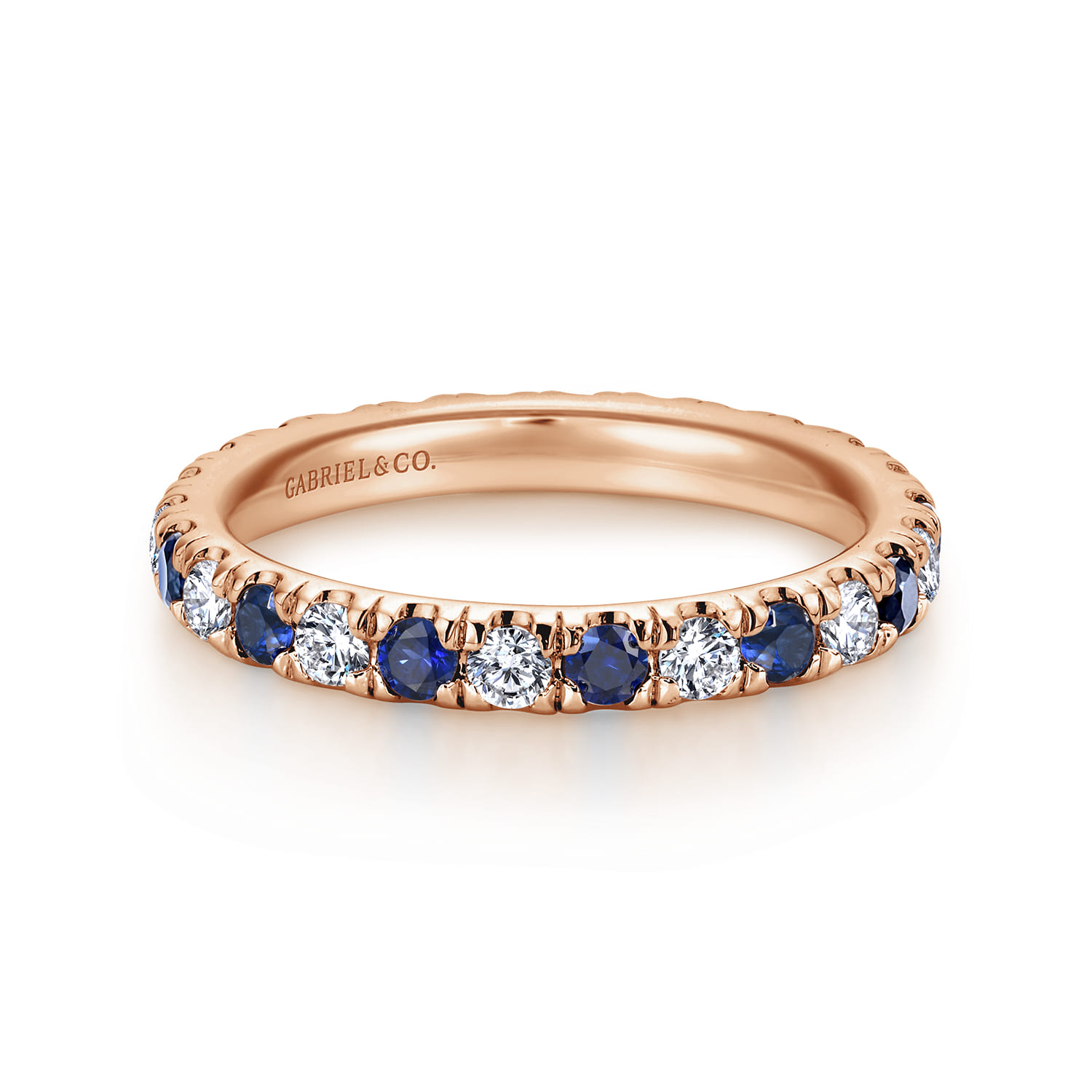 Eternity Band Wedding Ring in 14k Rose Gold with Round Sapphire at Gabriel & Co. - Shot 1