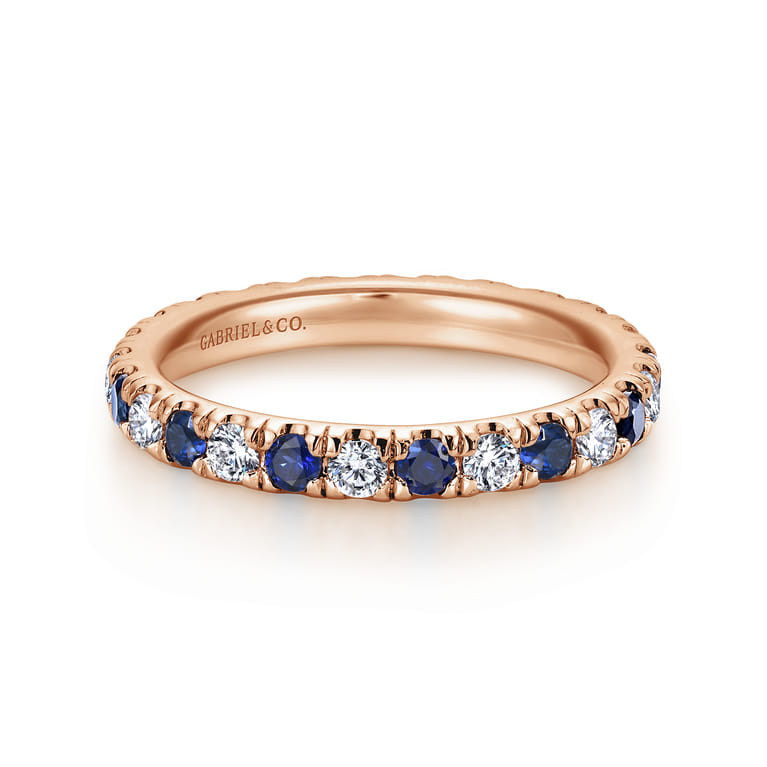 Eternity Band Wedding Ring in 14k Rose Gold with Round Sapphire at Gabriel & Co. - Shot 1