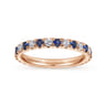 Eternity Band Wedding Ring in 14k Rose Gold with Round Sapphire at Gabriel & Co.