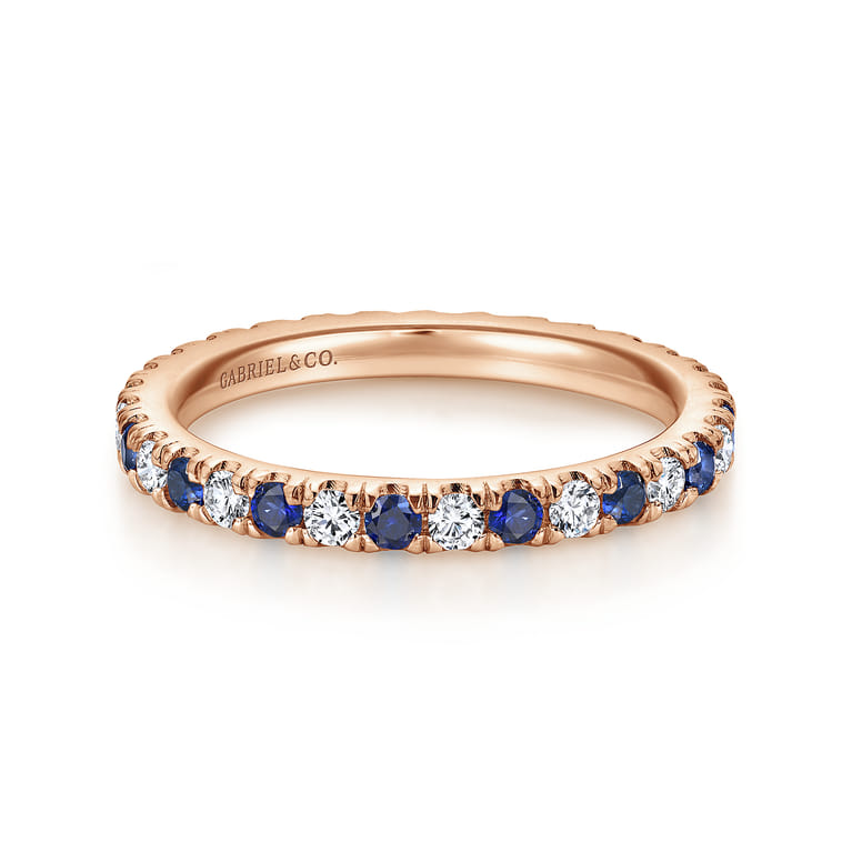 Eternity Band Wedding Ring in 14k Rose Gold with Round Sapphire at Gabriel & Co. - Shot 1