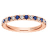 Eternity Band Wedding Ring in 14k Rose Gold with Round Sapphire at Gabriel & Co.