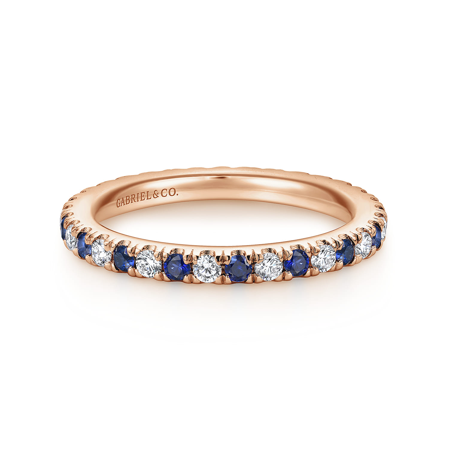 Eternity Band Wedding Ring in 14k Rose Gold with Round Sapphire at Gabriel & Co. - Shot 1
