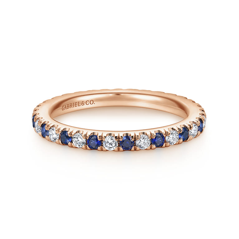 Eternity Band Wedding Ring in 14k Rose Gold with Round Sapphire at Gabriel & Co. - Shot 1