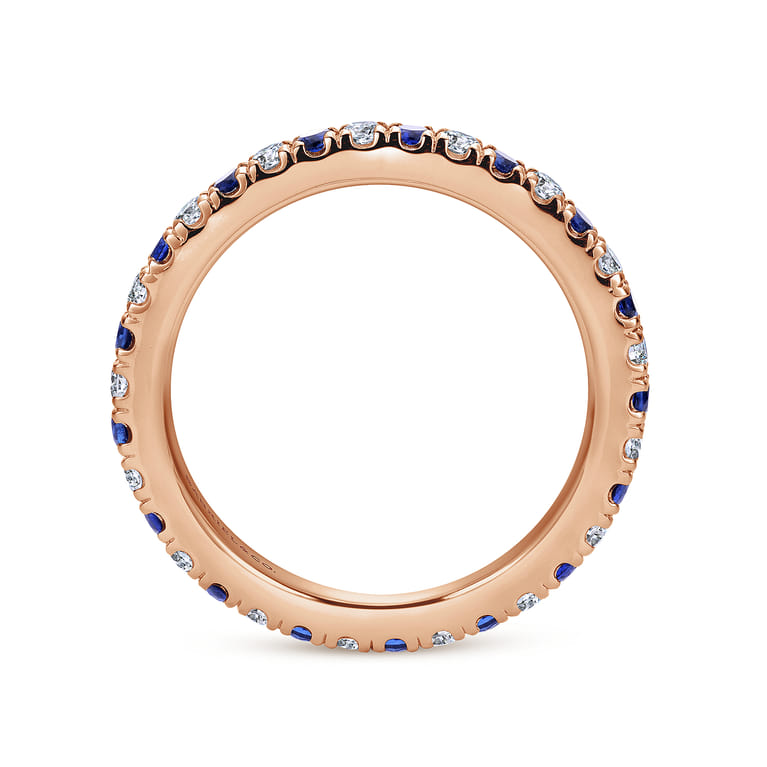 Eternity Band Wedding Ring in 14k Rose Gold with Round Sapphire at Gabriel & Co. - Shot 2