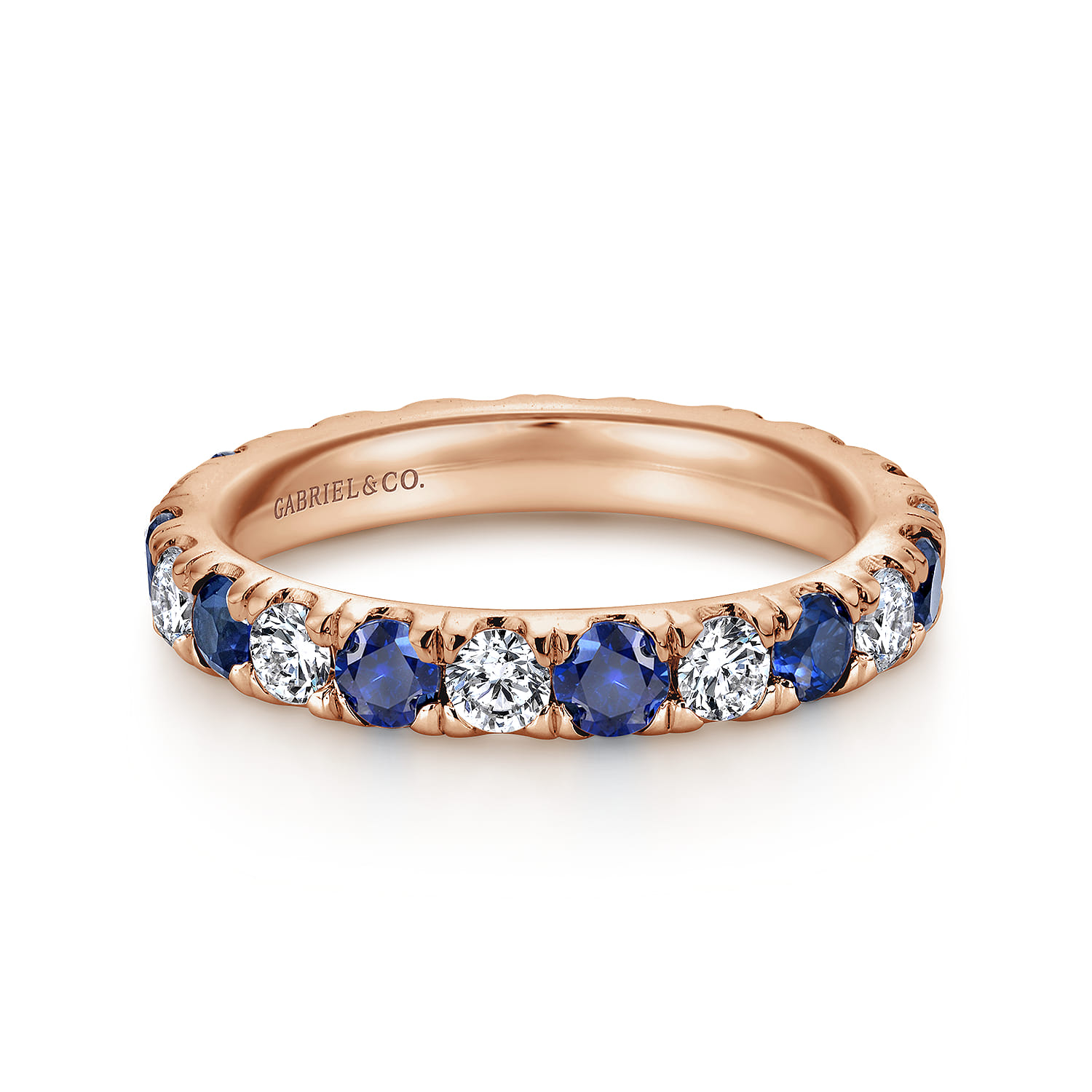 Eternity Band Wedding Ring in 14k Rose Gold with Round Sapphire at Gabriel & Co. - Shot 1