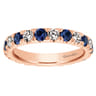 Eternity Band Wedding Ring in 14k Rose Gold with Round Sapphire at Gabriel & Co.