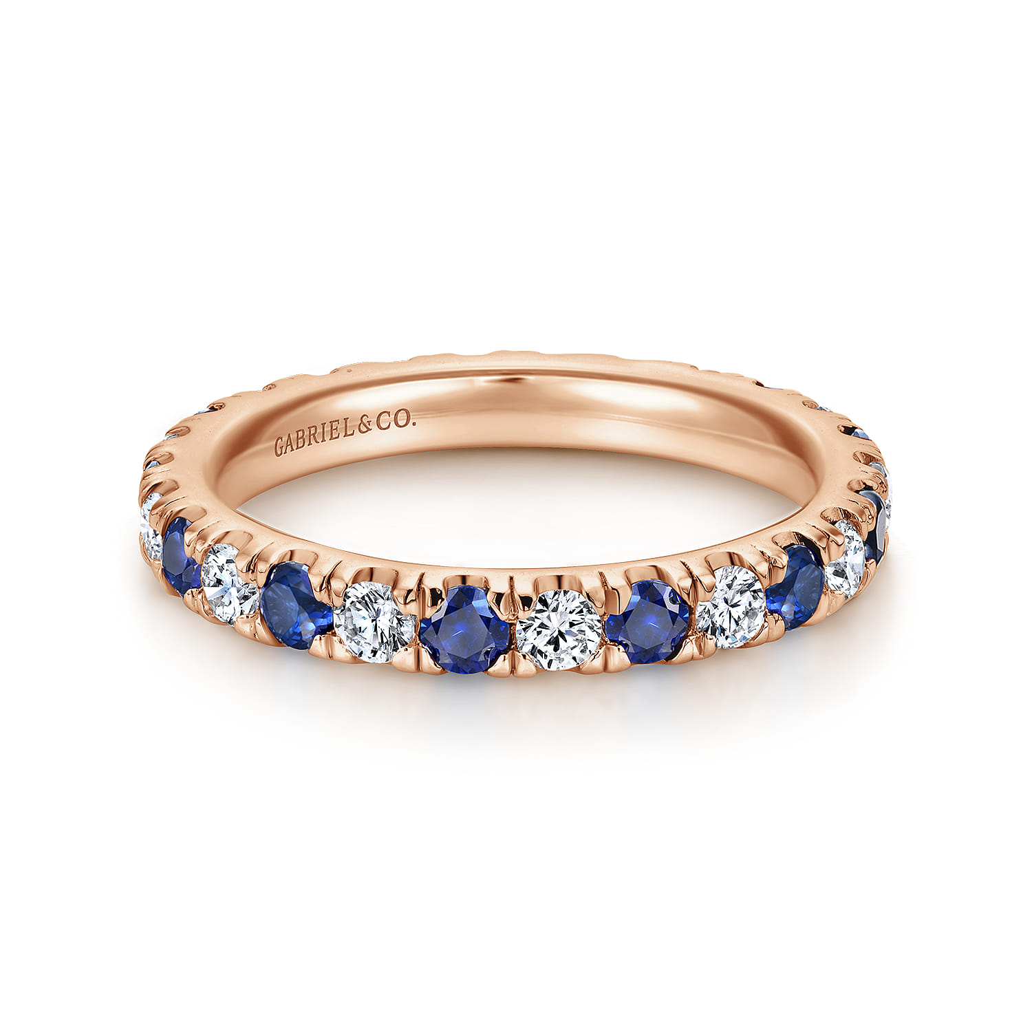 Eternity Band Wedding Ring in 14k Rose Gold with Round Sapphire at Gabriel & Co. - Shot 1