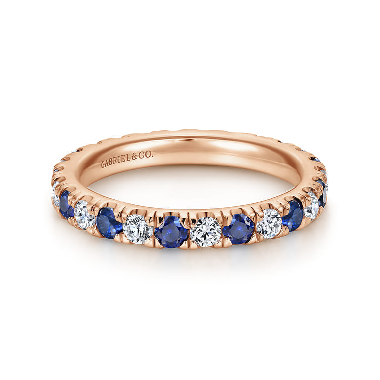 Eternity Band Wedding Ring in 14k Rose Gold with Round Sapphire at Gabriel & Co. - Shot 1