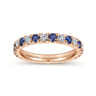 Eternity Band Wedding Ring in 14k Rose Gold with Round Sapphire at Gabriel & Co.