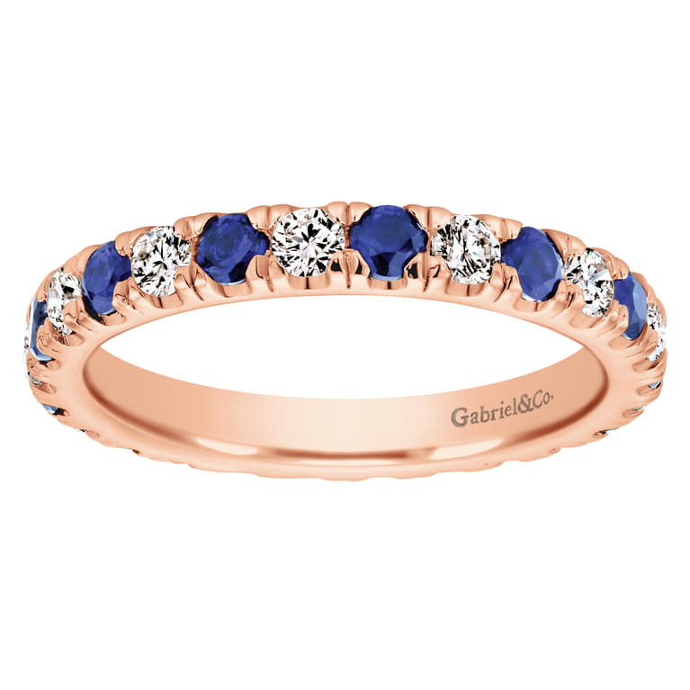 Eternity Band Wedding Ring in 14k Rose Gold with Round Sapphire at Gabriel & Co. - Shot 5