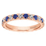 Eternity Band Wedding Ring in 14k Rose Gold with Round Sapphire at Gabriel & Co.