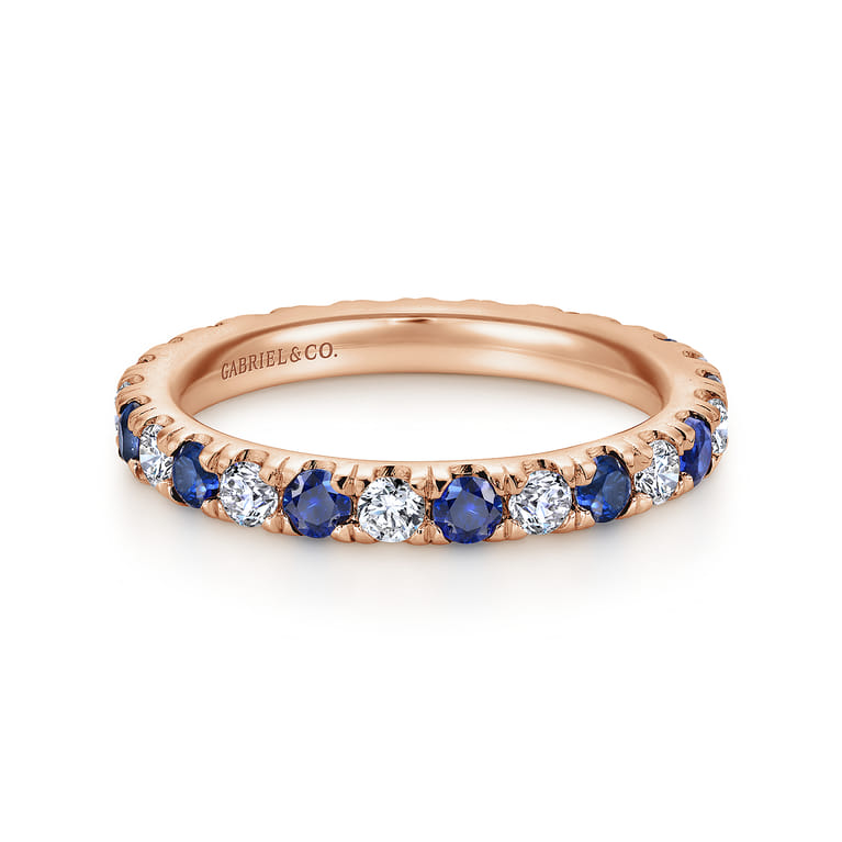 Eternity Band Wedding Ring in 14k Rose Gold with Round Sapphire at Gabriel & Co. - Shot 1