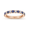 Eternity Band Wedding Ring in 14k Rose Gold with Round Sapphire at Gabriel & Co.
