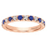 Eternity Band Wedding Ring in 14k Rose Gold with Round Sapphire at Gabriel & Co.