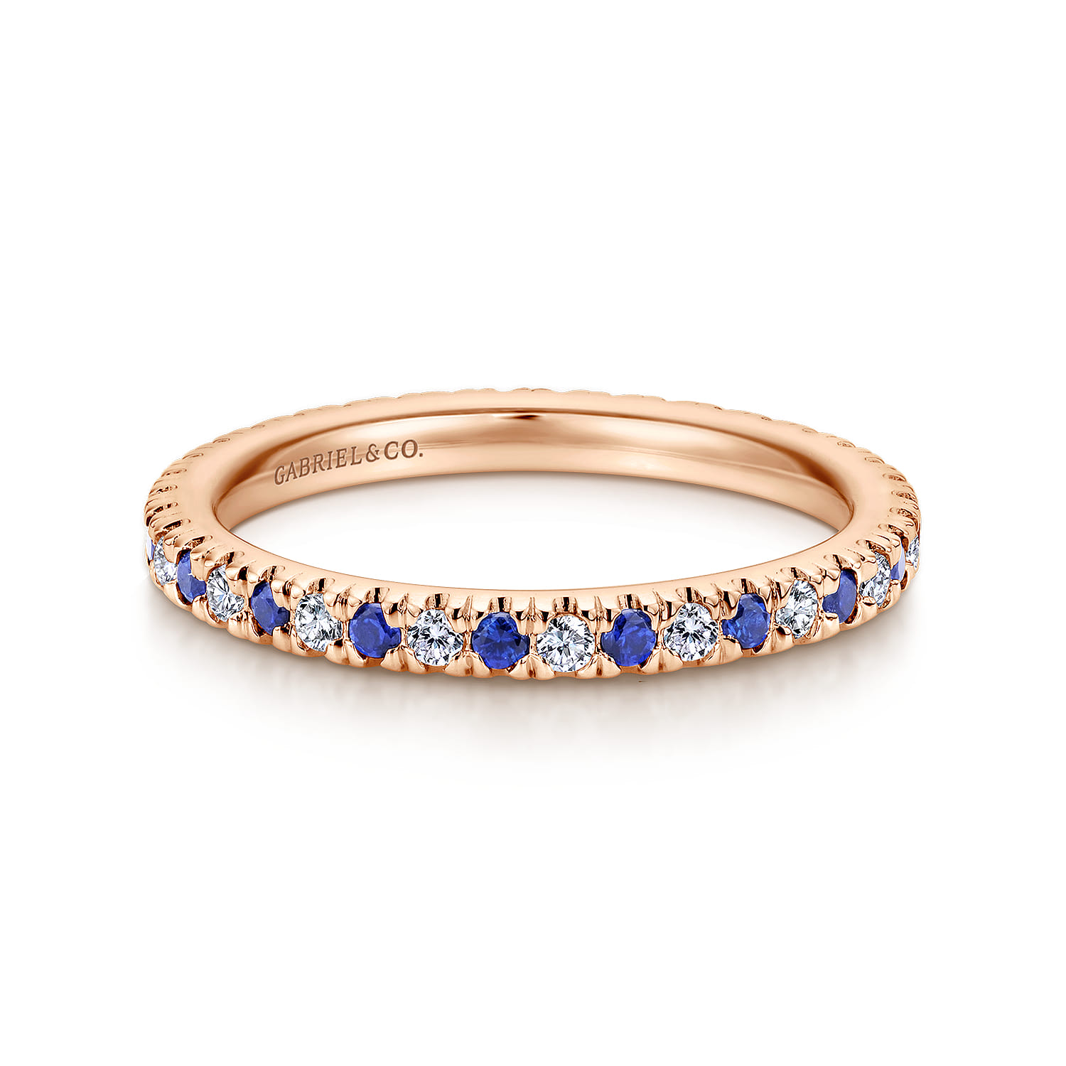 Eternity Band Wedding Ring in 14k Rose Gold with Round Sapphire at Gabriel & Co. - Shot 1