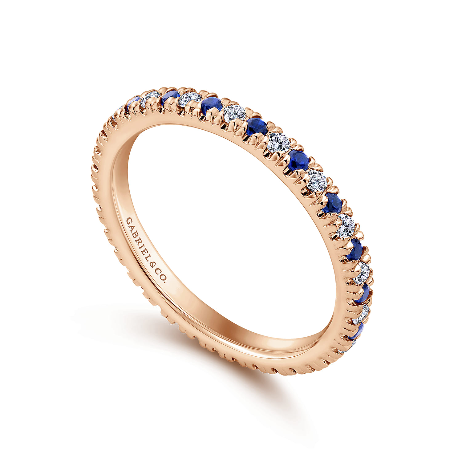 Eternity Band Wedding Ring in 14k Rose Gold with Round Sapphire at Gabriel & Co. - Shot 3