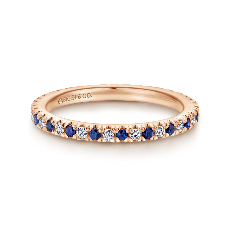 Eternity Band Wedding Ring in 14k Rose Gold with Round Sapphire at Gabriel & Co. - Shot 1
