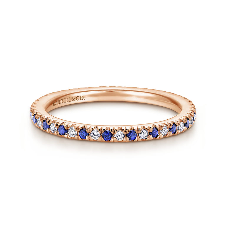 Eternity Band Wedding Ring in 14k Rose Gold with Round Sapphire at Gabriel & Co. - Shot 1