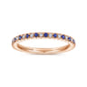 Eternity Band Wedding Ring in 14k Rose Gold with Round Sapphire at Gabriel & Co.