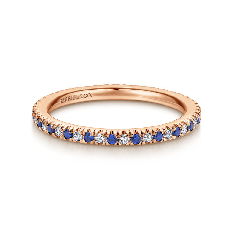 Eternity Band Wedding Ring in 14k Rose Gold with Round Sapphire at Gabriel & Co. - Shot 1
