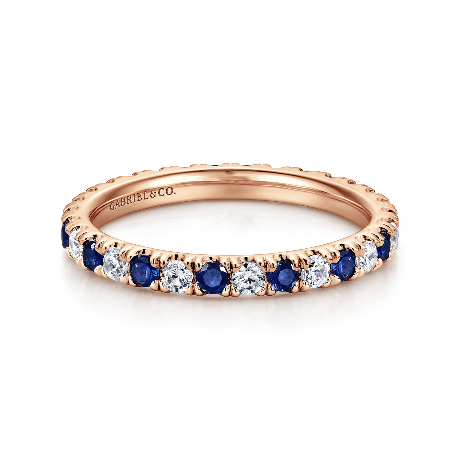 Eternity Band Wedding Ring in 14k Rose Gold with Round Sapphire at Gabriel & Co. - Shot 1
