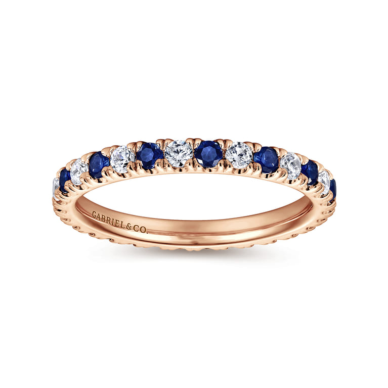 Eternity Band Wedding Ring in 14k Rose Gold with Round Sapphire at Gabriel & Co. - Shot 4