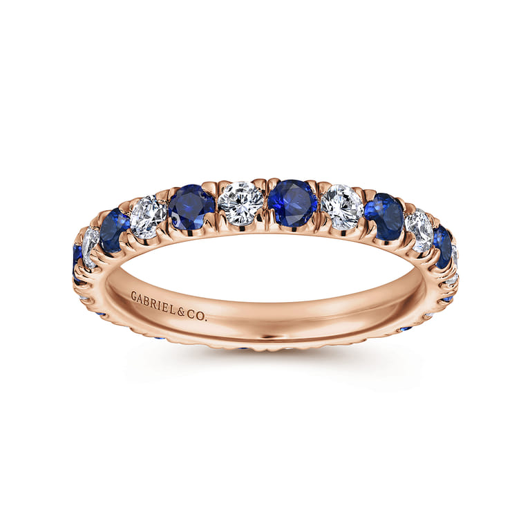 Eternity Band Wedding Ring in 14k Rose Gold with Round Sapphire at Gabriel & Co. - Shot 4