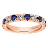 Eternity Band Wedding Ring in 14k Rose Gold with Round Sapphire at Gabriel & Co.
