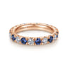 Eternity Band Wedding Ring in 14k Rose Gold with Round Sapphire at Gabriel & Co.
