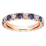 Eternity Band Wedding Ring in 14k Rose Gold with Round Sapphire at Gabriel & Co.