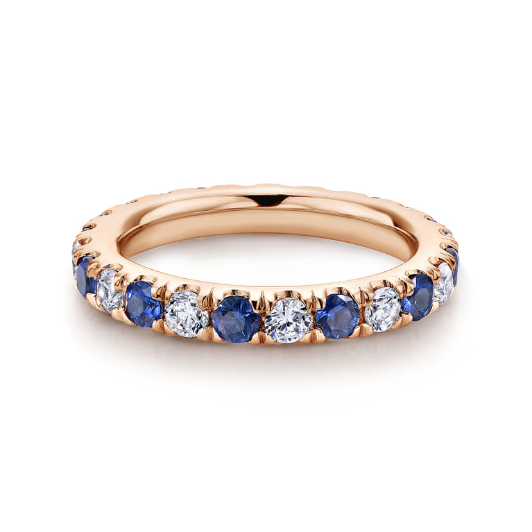 Eternity Band Wedding Ring in 14k Rose Gold with Round Sapphire at Gabriel & Co. - Shot 1