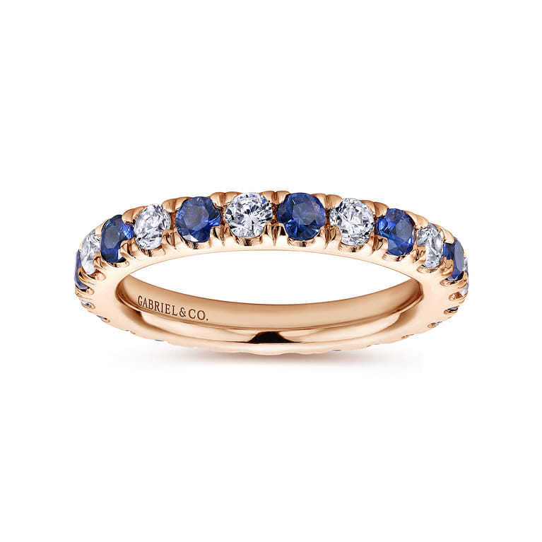 Eternity Band Wedding Ring in 14k Rose Gold with Round Sapphire at Gabriel & Co. - Shot 4