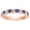 Eternity Band Wedding Ring in 14k Rose Gold with Round Sapphire at Gabriel & Co.