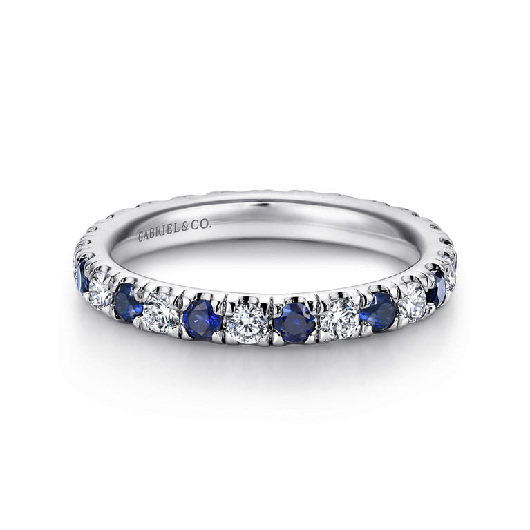 Eternity Band Wedding Ring in 14k White Gold with Round Sapphire at Gabriel & Co. - Shot 1