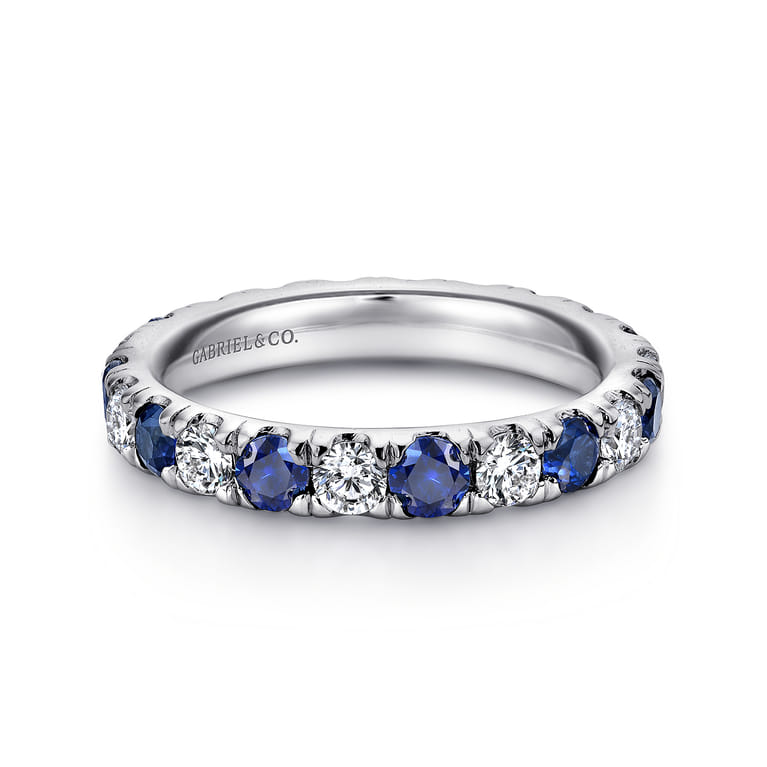 Eternity Band Wedding Ring in 14k White Gold with Round Sapphire at Gabriel & Co. - Shot 1