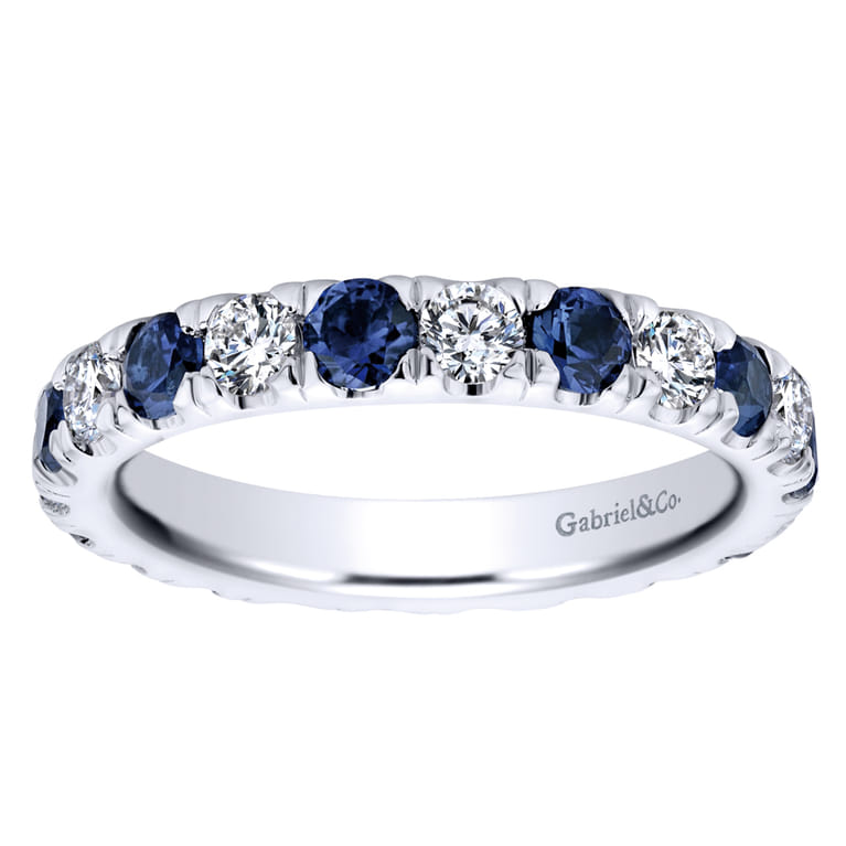 Eternity Band Wedding Ring in 14k White Gold with Round Sapphire at Gabriel & Co. - Shot 5