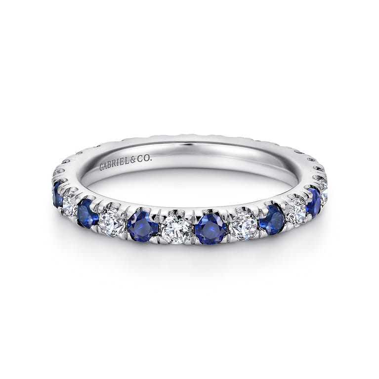 Eternity Band Wedding Ring in 14k White Gold with Round Sapphire at Gabriel & Co. - Shot 1