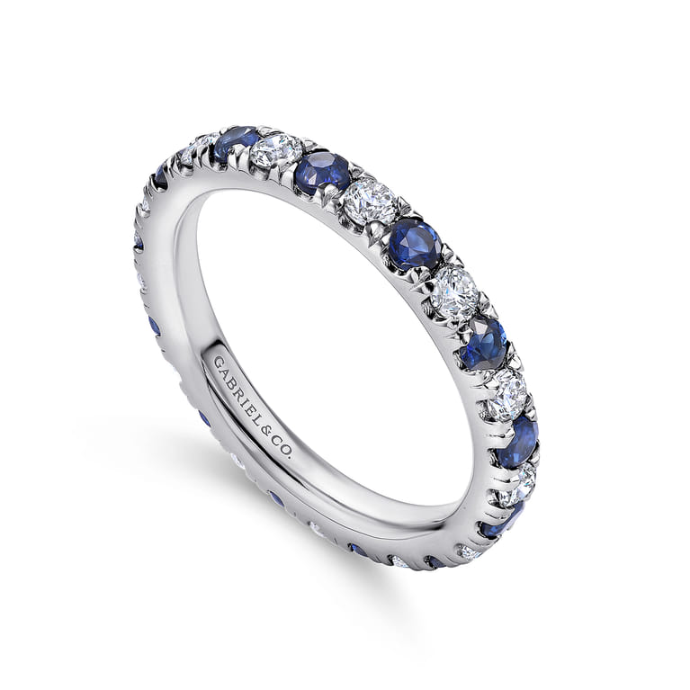 Eternity Band Wedding Ring in 14k White Gold with Round Sapphire at Gabriel & Co. - Shot 3