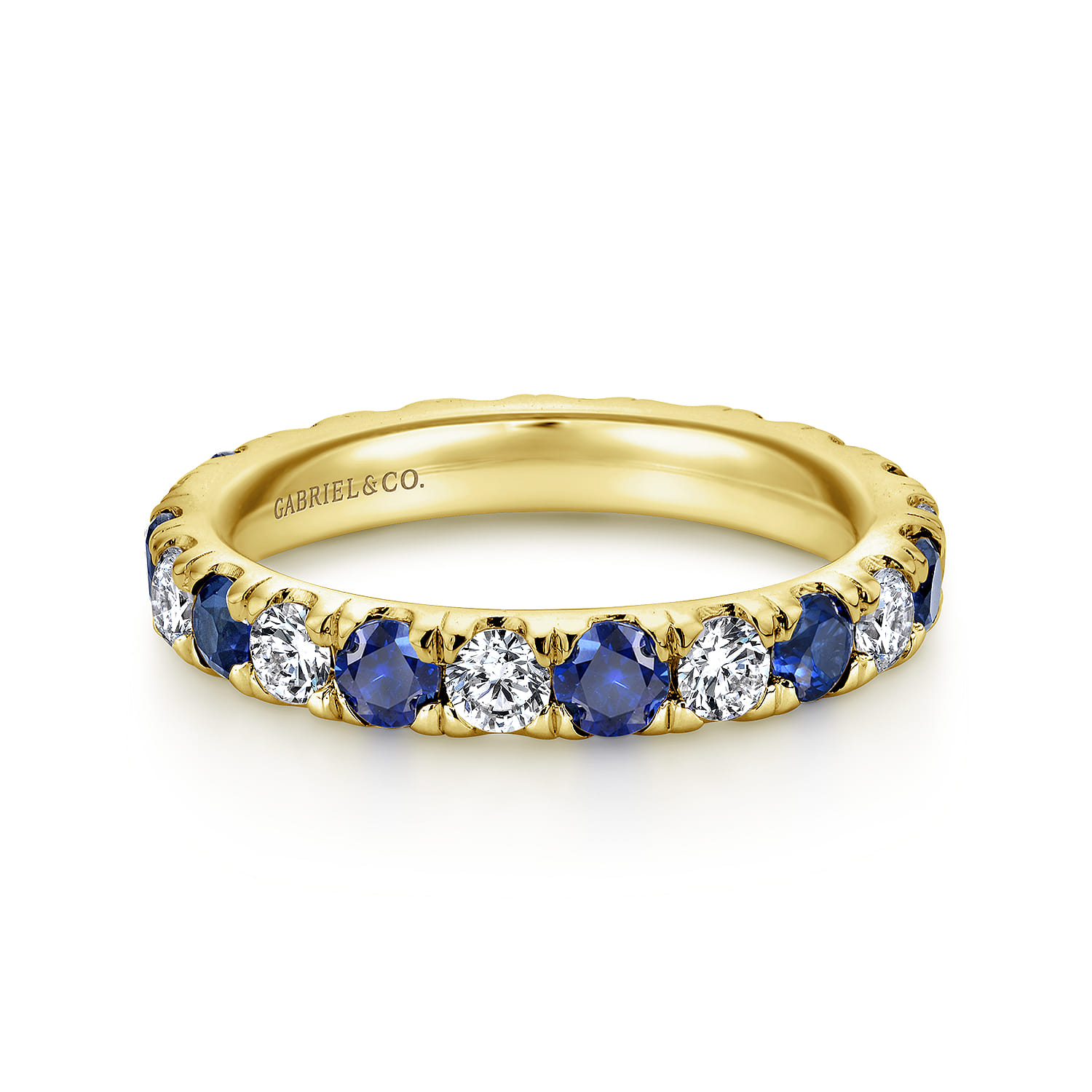 Eternity Band Wedding Ring in 14k Yellow Gold with Round Sapphire at Gabriel & Co. - Shot 1
