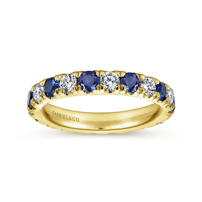 Eternity Band Wedding Ring in 14k Yellow Gold with Round Sapphire at Gabriel & Co. - Shot 4