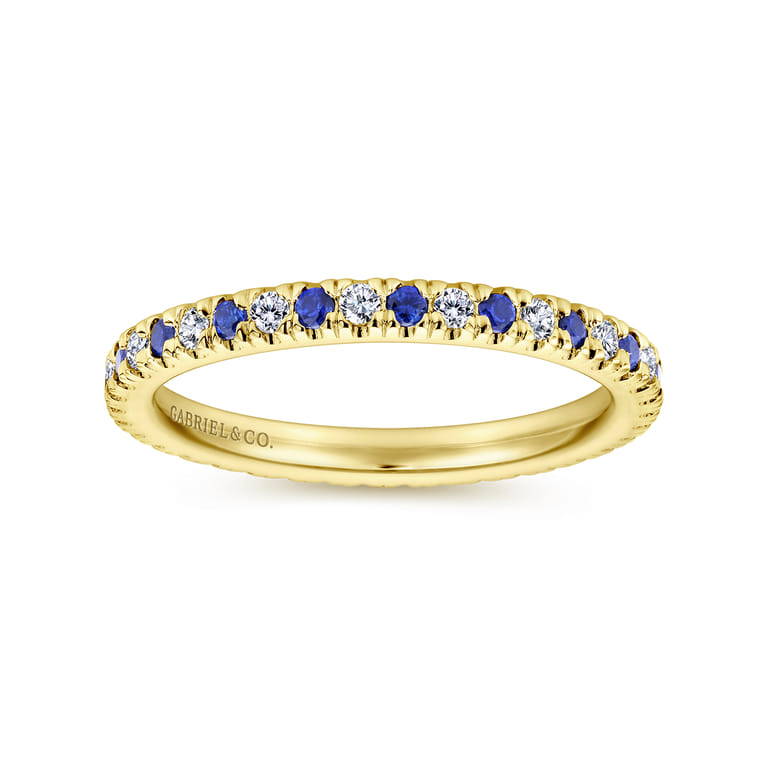 Eternity Band Wedding Ring in 14k Yellow Gold with Round Sapphire at Gabriel & Co. - Shot 4