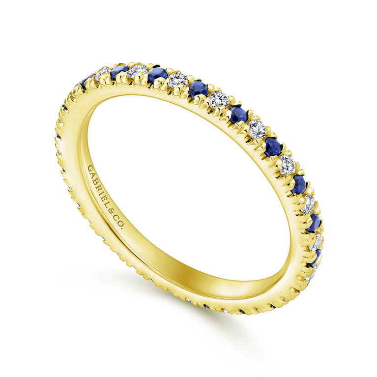 Eternity Band Wedding Ring in 14k Yellow Gold with Round Sapphire at Gabriel & Co. - Shot 3