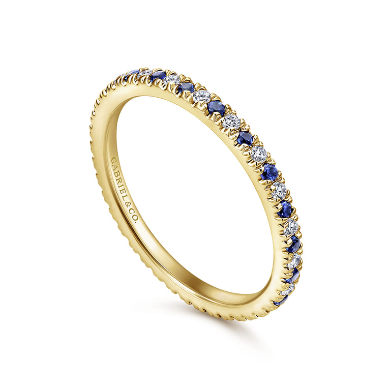 Eternity Band Wedding Ring in 14k Yellow Gold with Round Sapphire at Gabriel & Co. - Shot 3