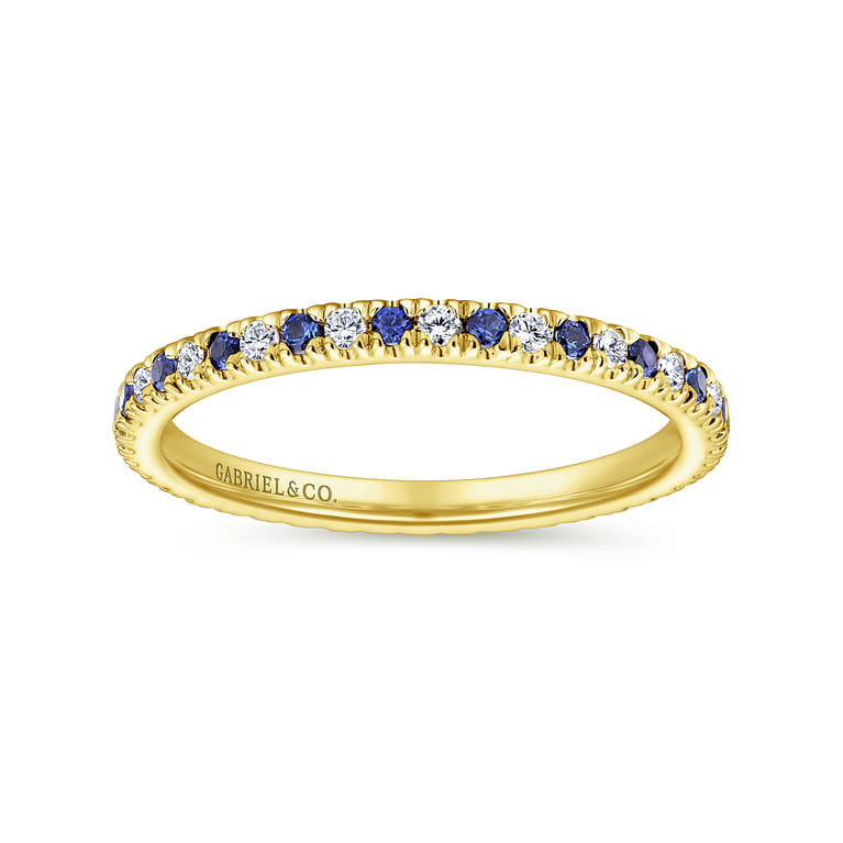Eternity Band Wedding Ring in 14k Yellow Gold with Round Sapphire at Gabriel & Co. - Shot 5