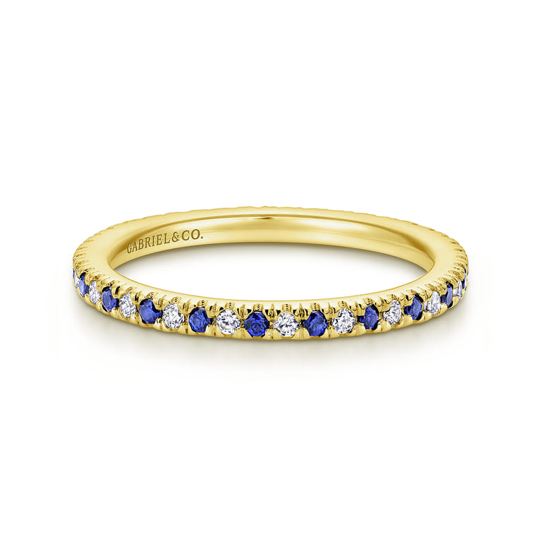 Eternity Band Wedding Ring in 14k Yellow Gold with Round Sapphire at Gabriel & Co. - Shot 1